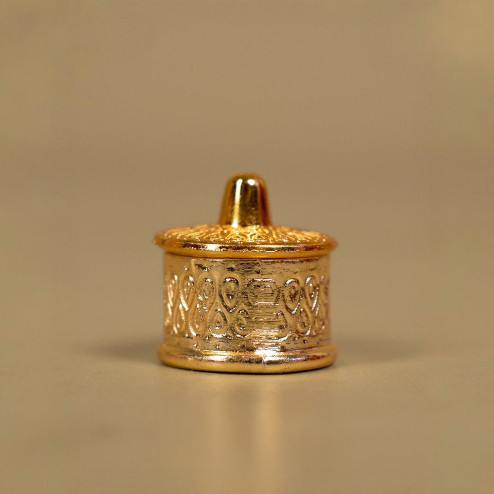 Ornate Golden Kumkum Container
